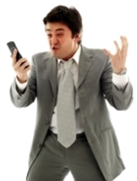 angry businessman with cellular phone over white