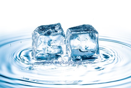 ice cubes falling on water surface