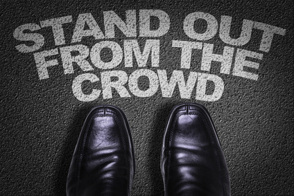Top View of Business Shoes on the floor with the text: Stand Out From the Crowd
